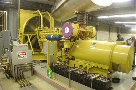 Caterpillar 3516 emergency generator installation with supporting UL142 compliant double contained fuel daytank at a San Francisco Bay Area data center.